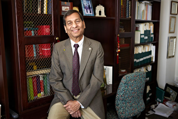 Suresh Sethi, Charles & Nancy Davidson Chair in Operations in his office