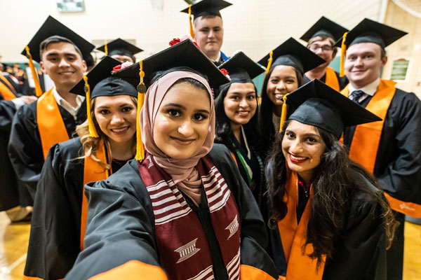 Bachelor's in Supply Chain Management students at graduation, ready to start their supply chain management careers